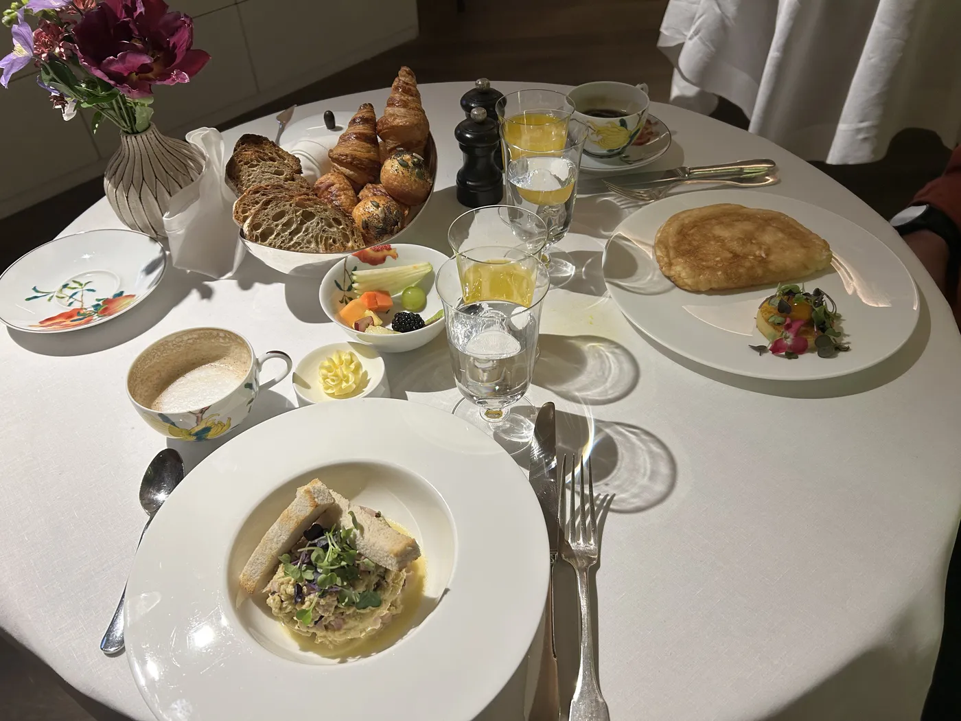 Breakfast with pastries, fruit and coffee at the Mercer Hotel Barcelona