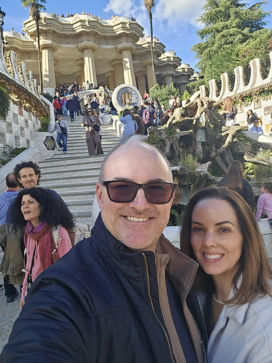 Jason and Heather on the mosaic staircase at Park Güell
