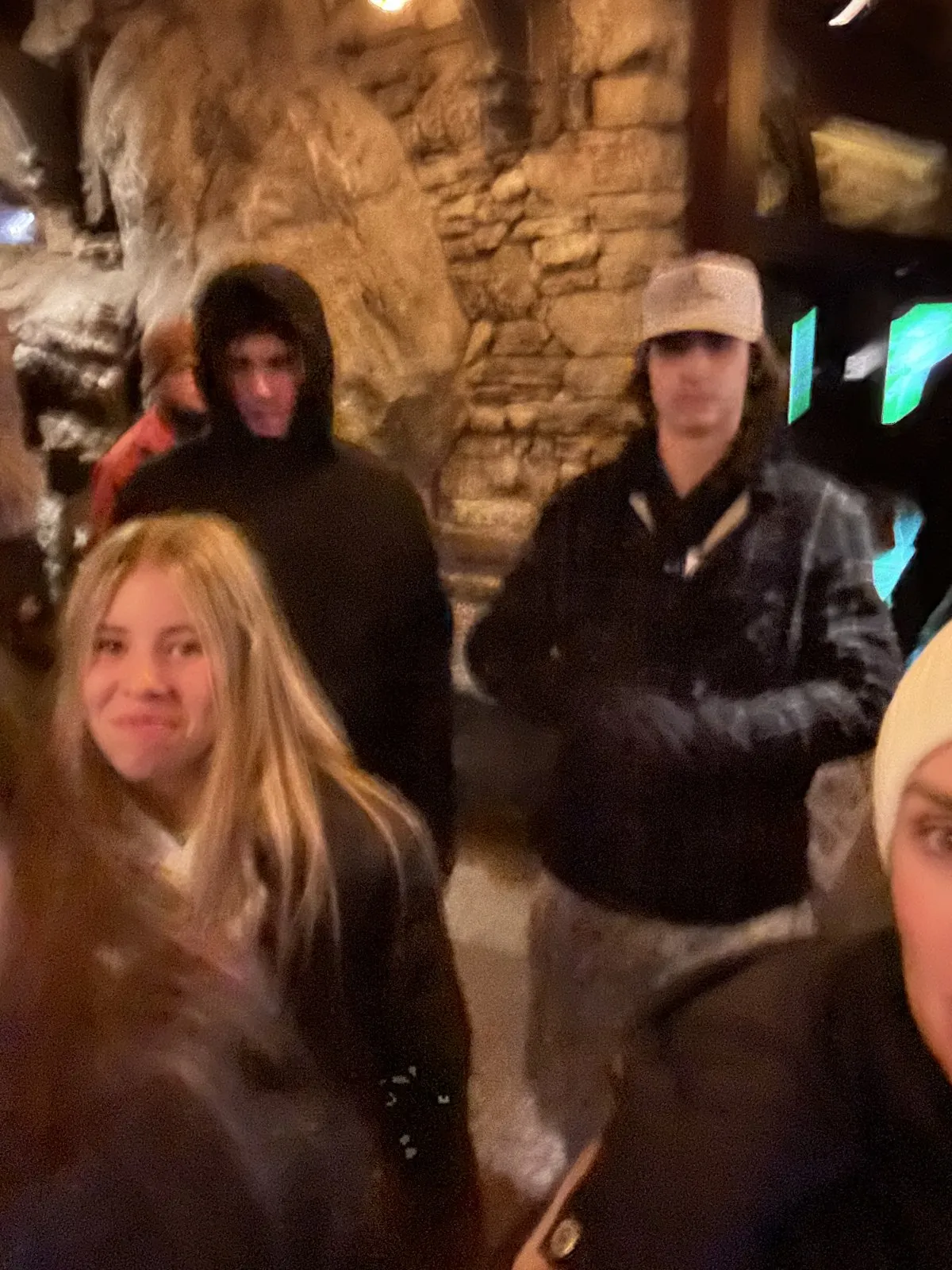 Kids inside a lit-up cave on the Lost Canyon trail at Top of the Rock