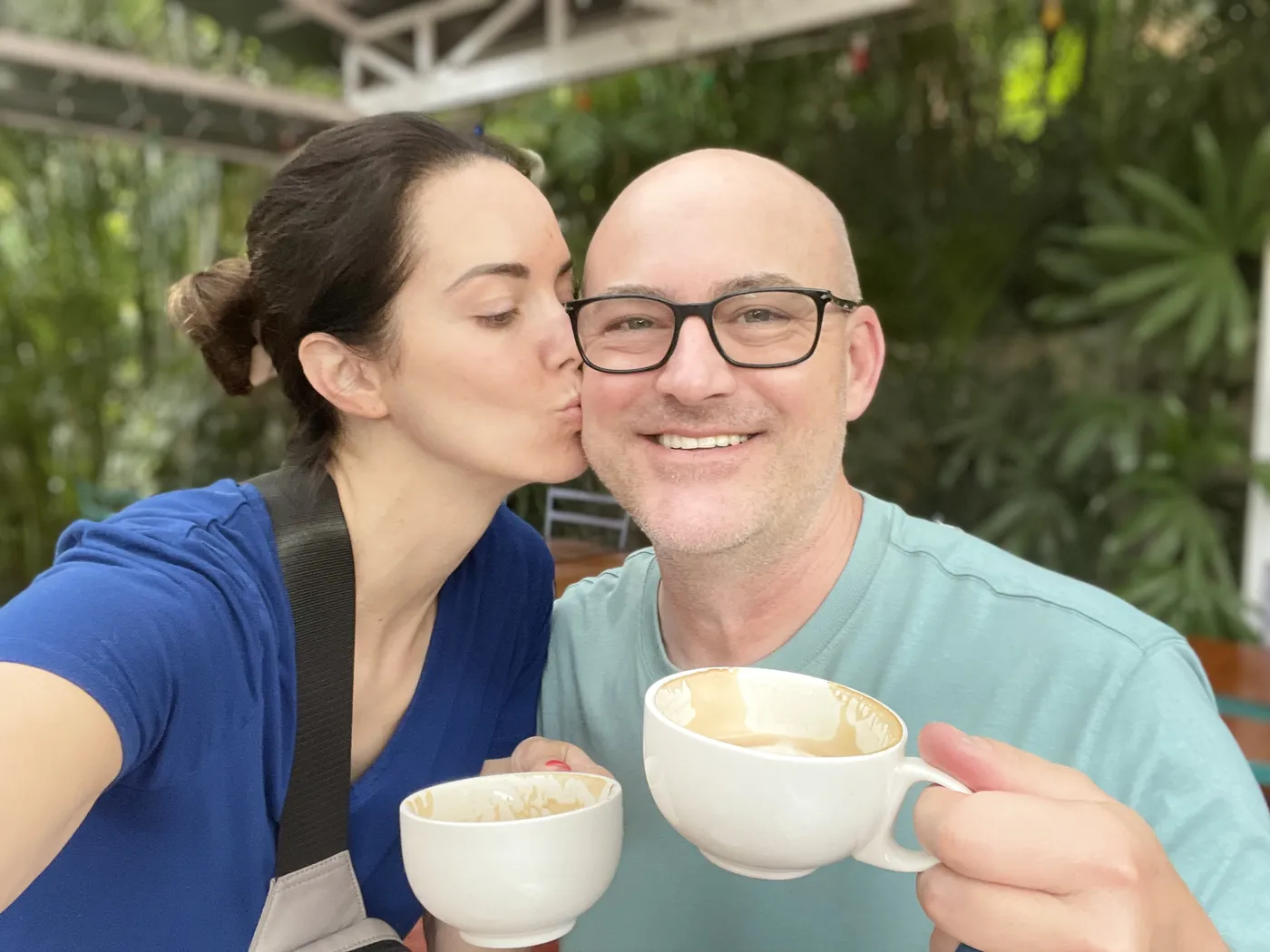 Jason and Heather sharing morning coffee at a roastery in Manuel Antonio