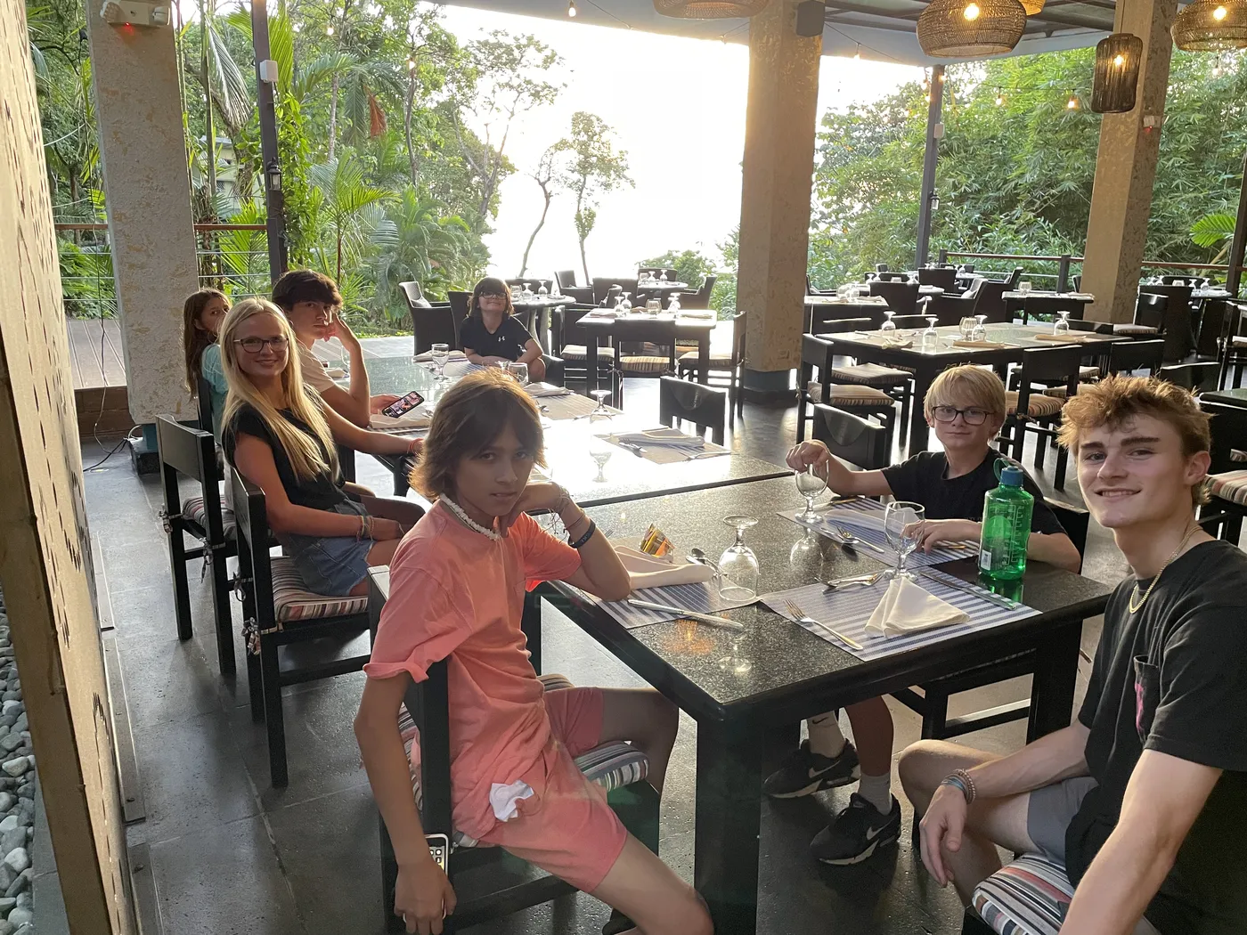 Family dinner at an open-air restaurant in Manuel Antonio