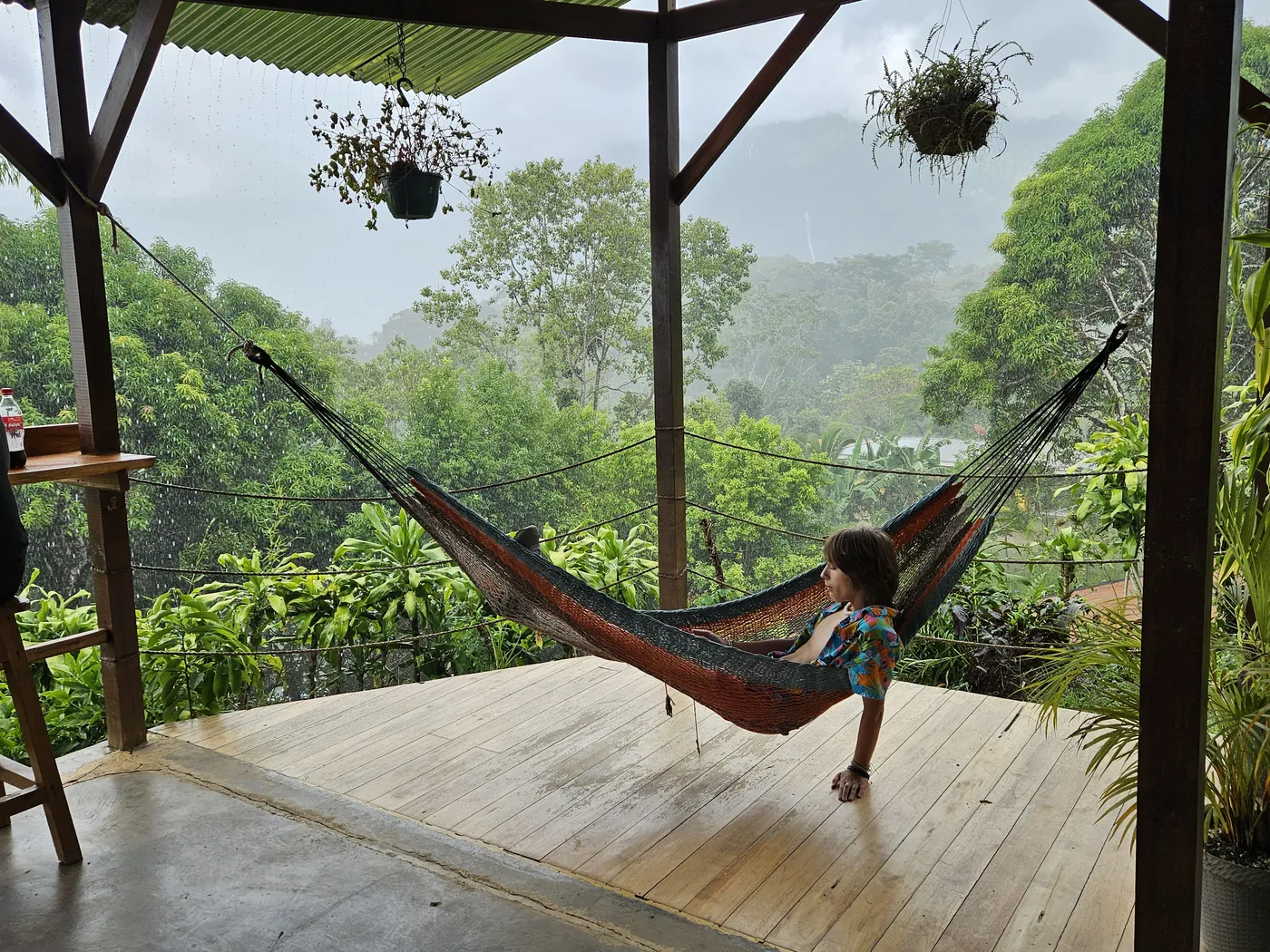 Hammock on an open-air deck overlooking the Costa Rican jungle