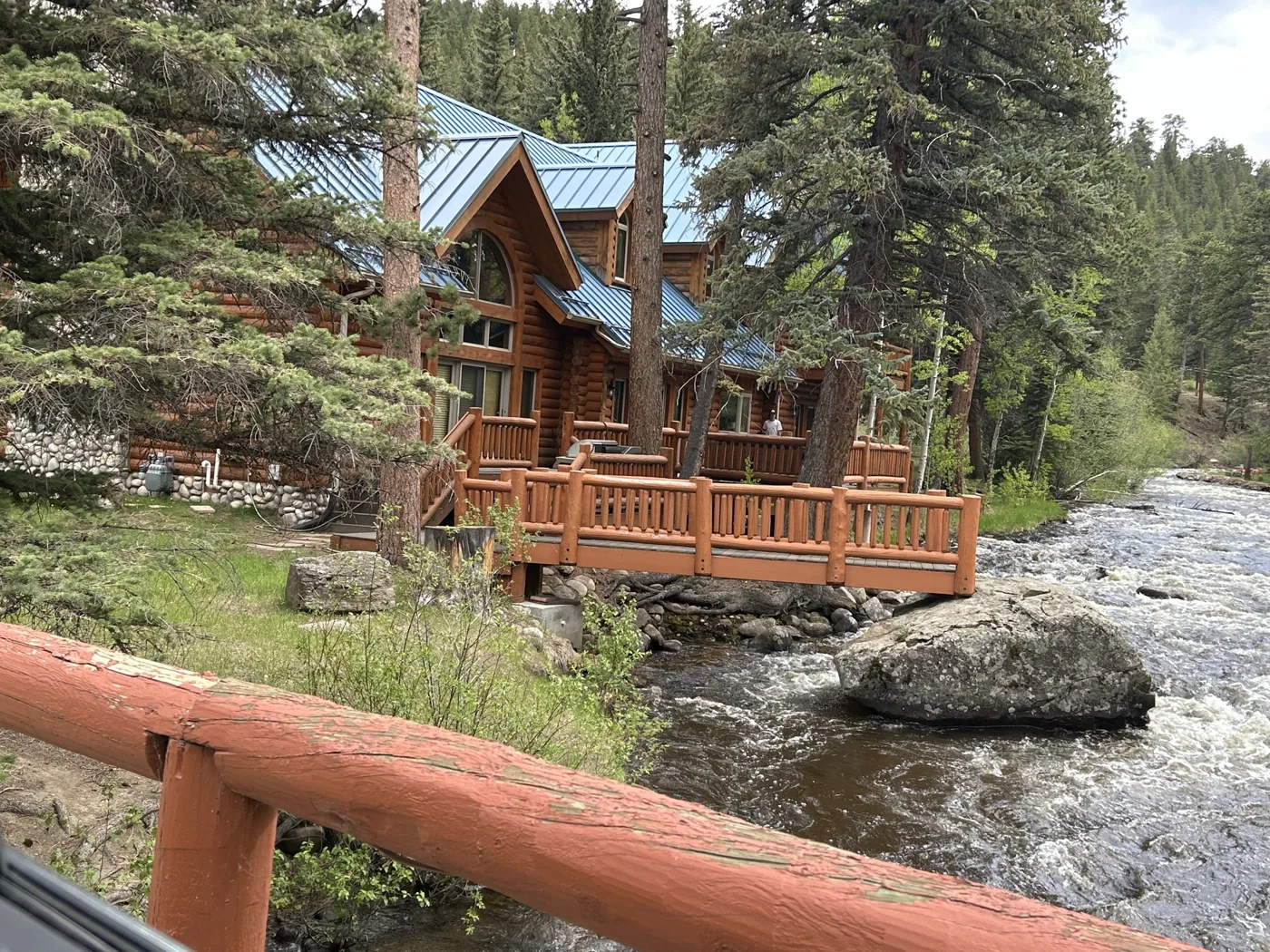 Log cabin on the river in Estes Park, Colorado