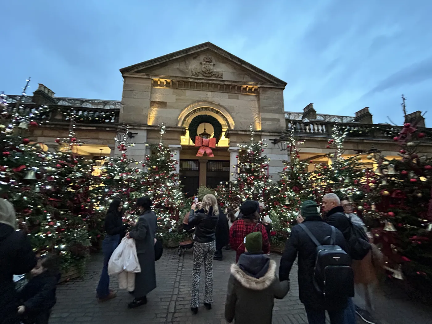 Christmas trees filling the Covent Garden piazza in front of St Paul's Church