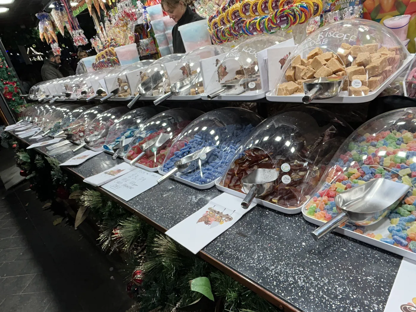 Pick-and-mix sweets in glass jars at a London candy shop